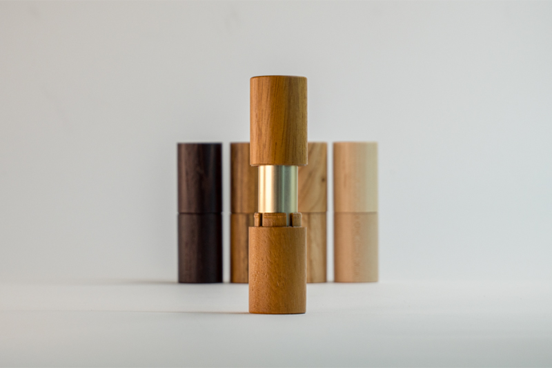Aptar Beauty & Quadpack revamp refillable lipstick encased in wood