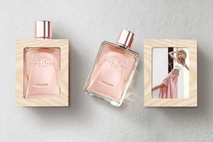Butterfly Cannon designs fragrance-photo frame hybrid pack for Oriflame
