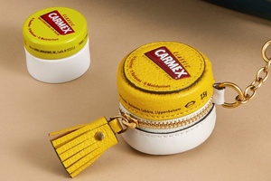 Carmex teams up with Anya Hindmarch on limited edition coin purse