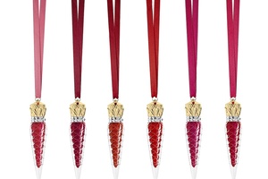 Christian Louboutin Beauty launches cabaret-inspired glitter lip gloss collection
