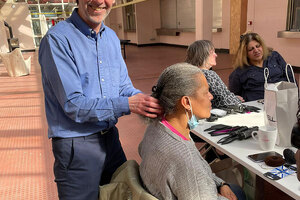 DENMAN supports Blind Aid Charity hair workshop