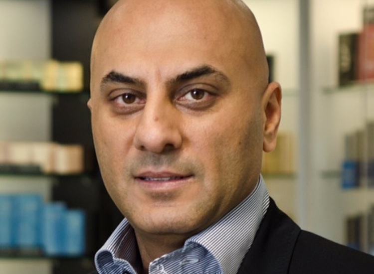 From refugee to CEO: The Fragrance Shop owner reflects on his journey
