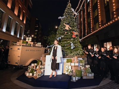 Harrods unveils festive window with actress Lily James
