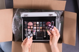 How do cosmetics brands feel about China's crackdown on excess packaging?