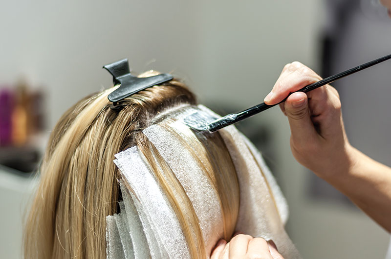 An ammonia/hydrogen peroxide/ persulfate mix lightens hair but can effect the properties of hair