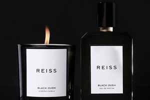 Next acquires 25% stake in Reiss 
