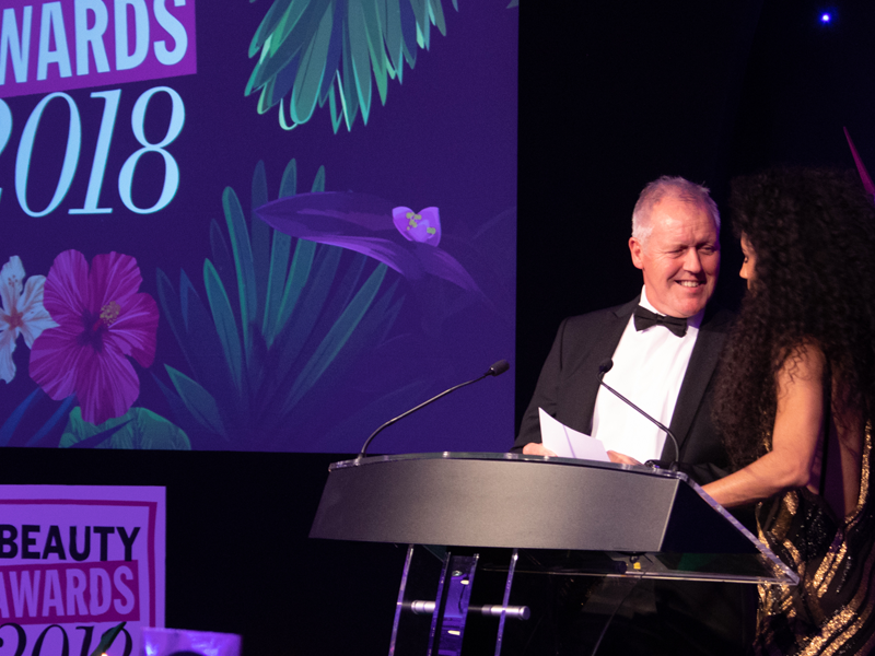 Returning sponsor Cygnia on stage announcing the 2018 Best New British Brand winner