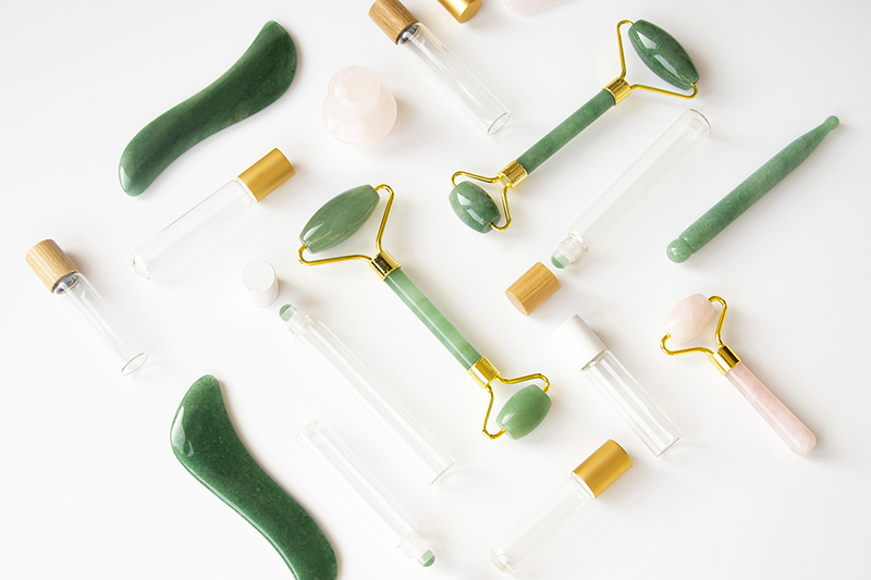 Quadpack’s Gua Sha massage tools and roll-ons use jade and rose quartz

