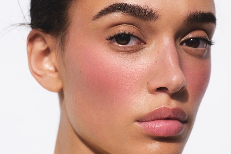 Model wearing Victoria Beckham Beauty's Blush Stylus