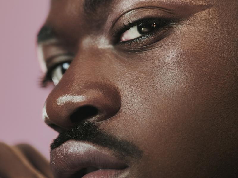 Lil Nas X models different make-up looks created with YSL Beauty products